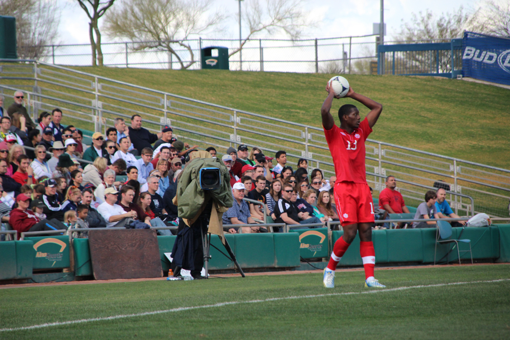 Canadian defender Doneil Henry prepares to throw the ball in play at Kino Sports Complex on Jan. 26, 2013, in Tucson, Ariz. The matchup between Canada and Denmark was the first international friendly held in the city. (Photo by Kyle Johnson)