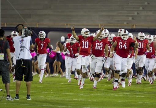 The Arizona football team has a lot of excitement building up for the 2013 season, in large part thanks to the success Matt Scott (#10) had last year in Rich Rodriguez's first as head coach. Photo by Tyler Besh/Arizona Daily Wildcat