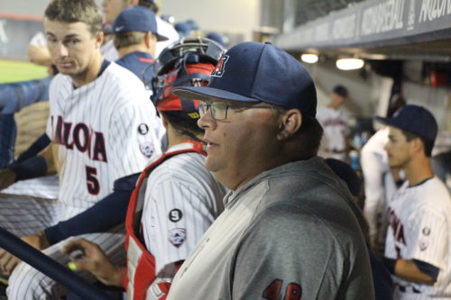 Coach Wanaka, right, looks on as the Arizona Wildcats baseball team competes against Team USA. (Photo by Justin Wylie).