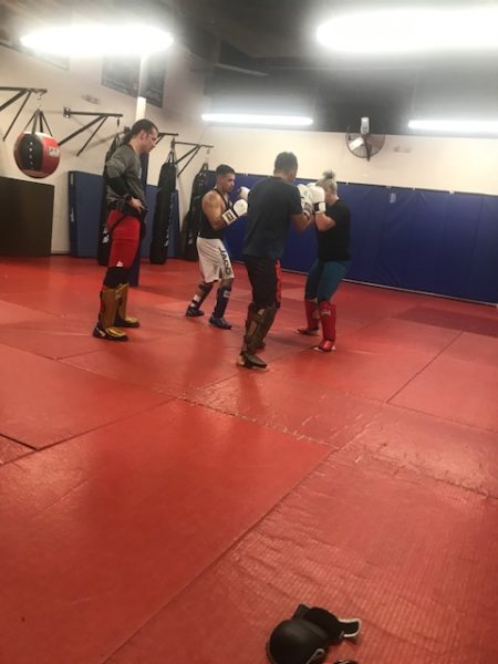 Elizabeth McMullin practices her punching technique. (Photo by Phillip Bramwell)