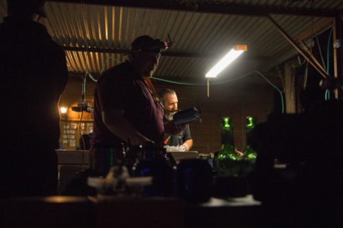 Pilots in the pit area, readying their gear before they race. (Photo by Matt Crisara)