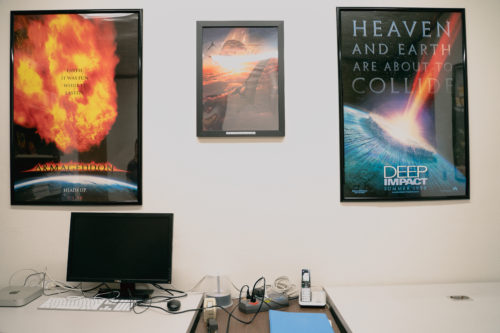 A room inside the Sky Survey’s offices is covered in movie posters and other art that picture a massive meteor destroying Earth.