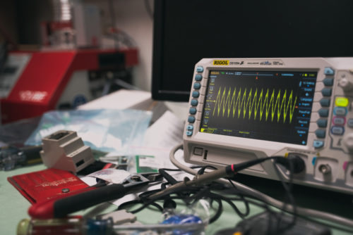 In the basement of the Sky Survey’s office is a work station with tools used to measure operating conditions, such as this oscilloscope that measures different wavelengths in the air.