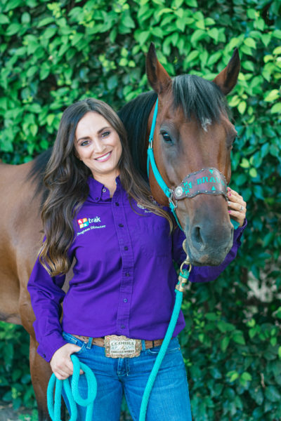 Chelsea Menke, program director of TRAK with her horse Bravo.